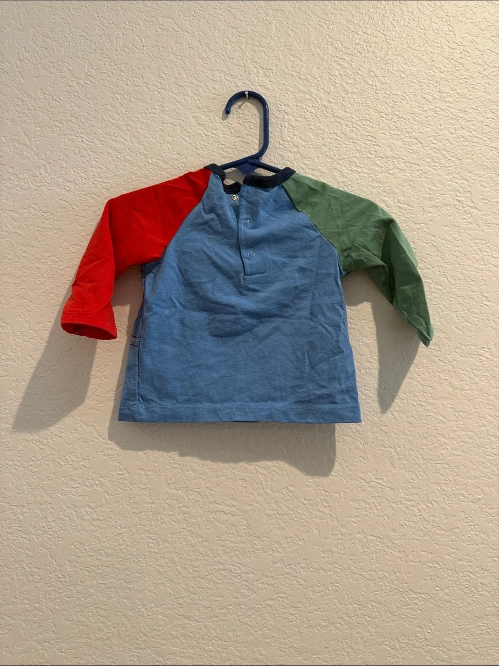 Little Me Light Blue Top with Navy Trim and Red Accent